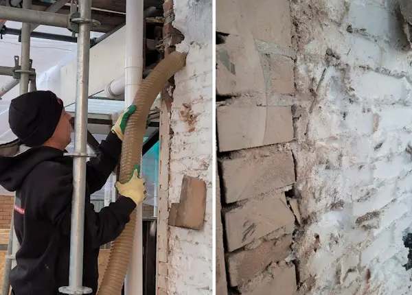 vastgoedonderhoud via gevelrenovatie door isolatie van de muur te zuigen met sterke stofzuiger en Big Bag